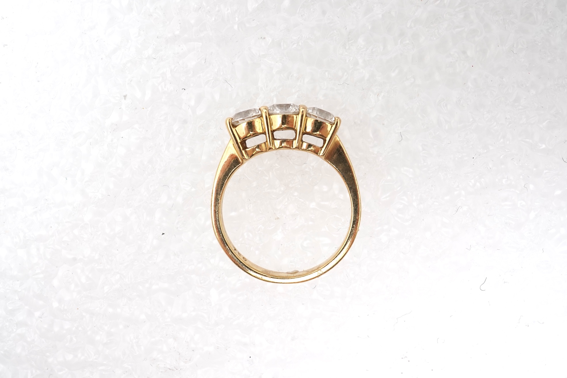 A three-stone diamond ring